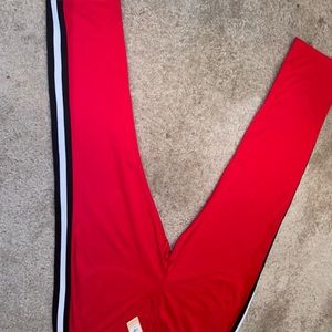 Red track pants